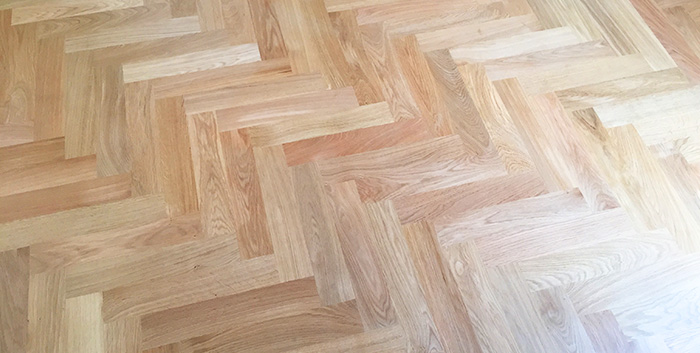 Pose de parquet : motif à bâtons rompus